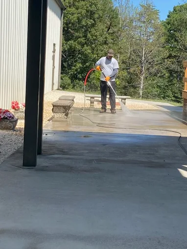 Pressure washing concrete surfaces and driveways