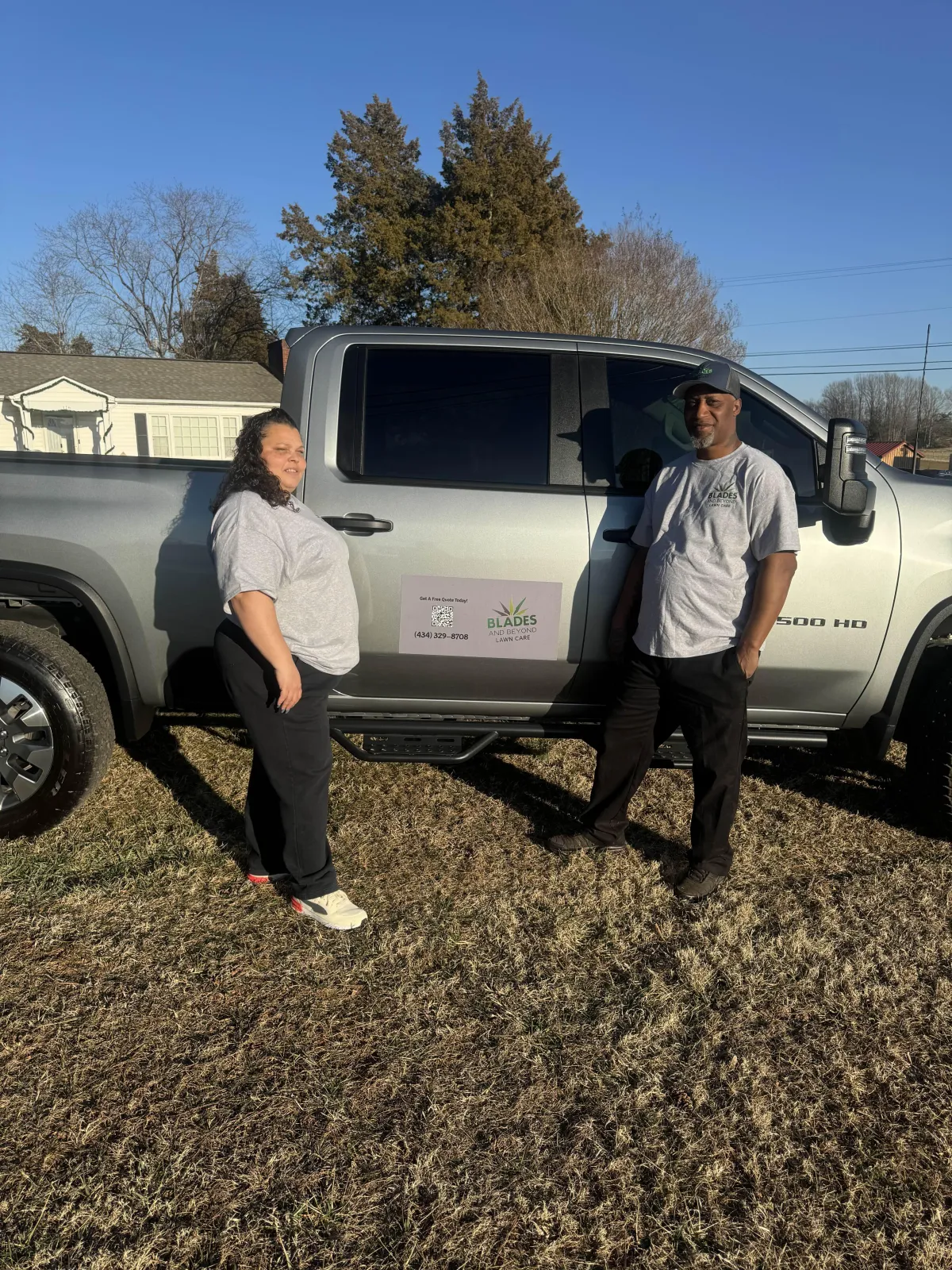 Romeco and Orelia, owners of Blades and Beyond Lawn Care, professional lawn care in Lynchburg VA